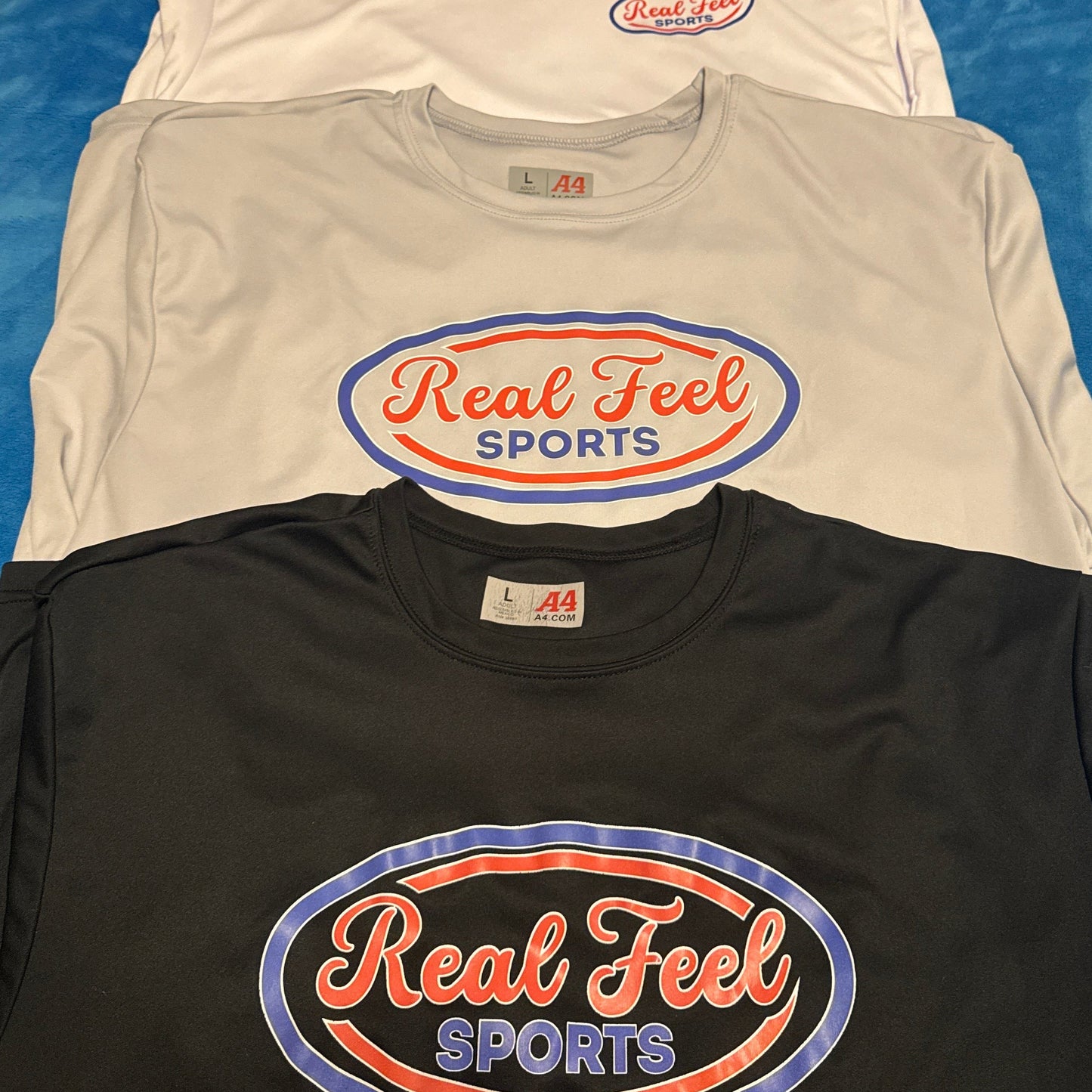Real Feel Sports Athletic Tees
